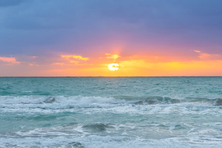 Waves and sunset at South Beach in Miami, United Statesの写真素材