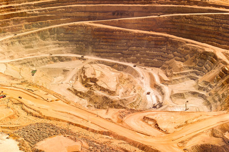 Close-up aerial view of the pit of a copper mine at the altiplano of the Atacama Desert in northern Chileの写真素材