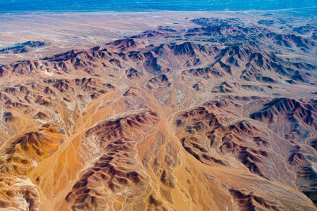 Aerial view of dry rivers and mountains in the altiplano of the Atacama Desert, Chile.の写真素材