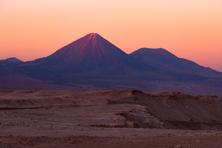 Licancabur volcano and and altiplano at dusk in the Atacama Desert, Chileの写真素材
