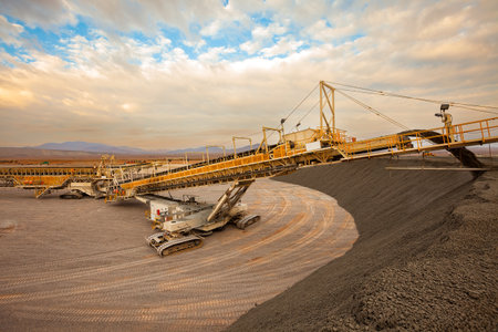 Machinery stacking copper sulfide deposits at a copper mine in Chileの写真素材