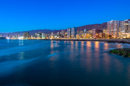 Panoramic view of the coastline of Antofagasta, know as the Pearl of the North and the biggest city in the Mining Region of northern Chileの写真素材
