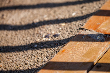Color picture of boardwalk path in sand on beach closeupの写真素材
