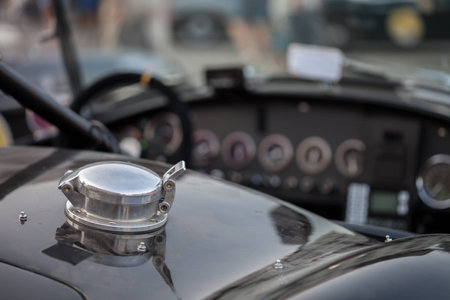 Close-up of fuel filler cap and car bodyの写真素材