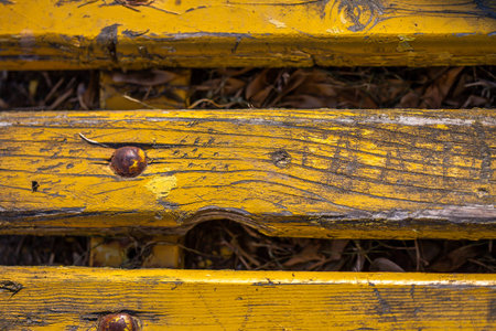 Abstract background of wooden yellow painted planks closeupの写真素材
