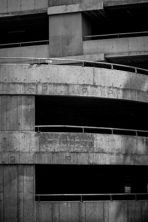 Black and white picture of a concrete parking lotのeditorial素材