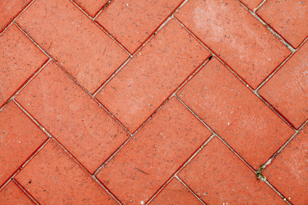 Color picture of tiled red brick pavement, detail