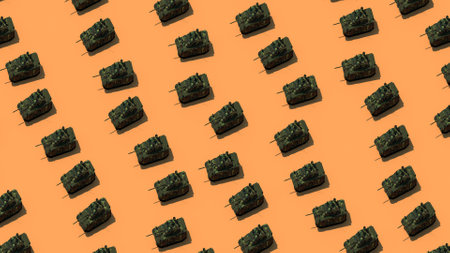 Pattern of green military tanks on orange background. minimal concept.の写真素材