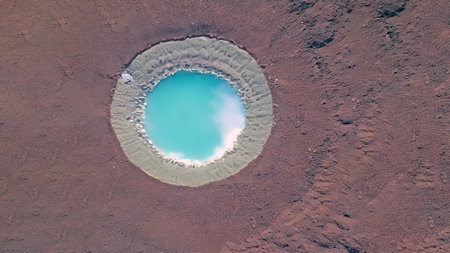 Aerial view of volcanic crater with blue lake in Hawaii Volcanoes National Parkの写真素材