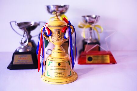 My beautiful ceramic golf trophy and others on white backgroundの写真素材