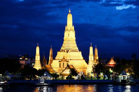 Pagodas of the Temple at Dawn in night light under deep blue skyの写真素材