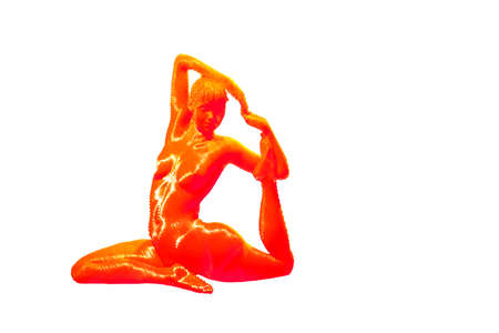 Orange color picture of a sitting woman does yoga isolated on whiteの写真素材