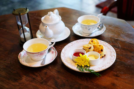 English tea set with desserts on wood table 1の写真素材