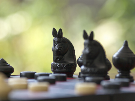 The Thai chess on the black & red table