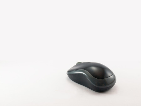 the black computer mouse on white background.のeditorial素材