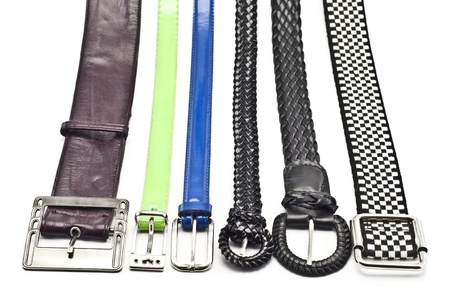 Stylish women's belts on a white background