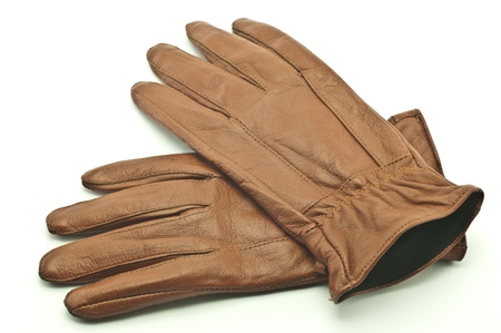 Brown leather gloves on a white backgroundの写真素材