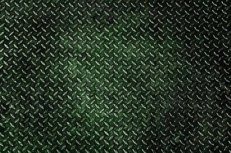Background of old metal diamond plateの写真素材