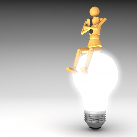 The wooden doll with light bulb 3d illustrationの写真素材