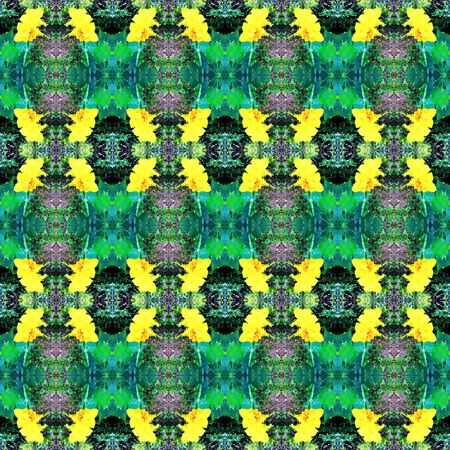 Kaleidoscope yellow flower on green tree pattern backgroundの写真素材