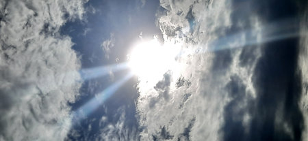 Sunset in the clouds. Panoramic view of the sky.の写真素材