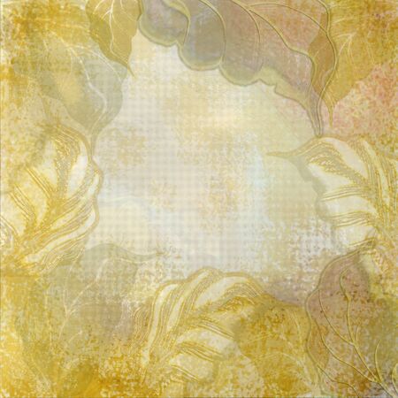 yellow leaves on beige backgroundの写真素材