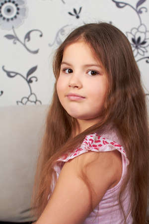 little girl sitting.の写真素材