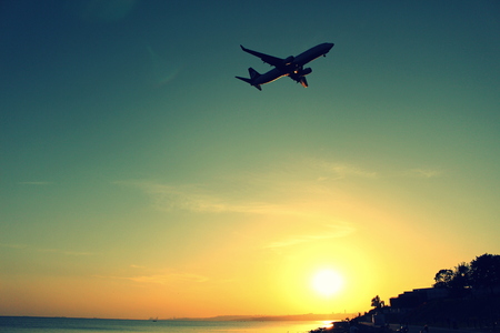 sunset aircraft take offの写真素材