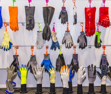 Colroful Safe Working Gloves On The Wall