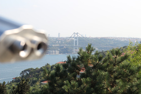 Istanbul Bosphorus Bridge and blurred coin operated binocularの写真素材
