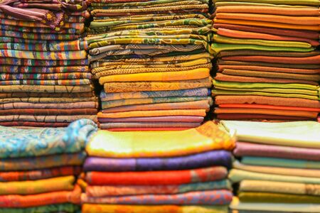 Stacked colorful Turbans for headwear, shallow depth of fieldの写真素材