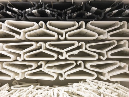 Empty clothes hanger on the lineの写真素材