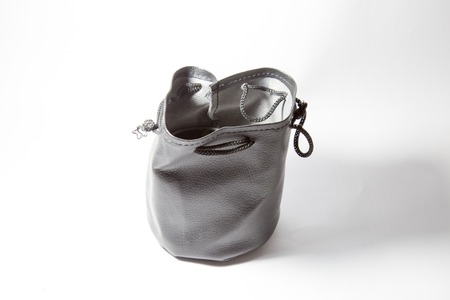 Isolated black leather pouch empty singleの写真素材