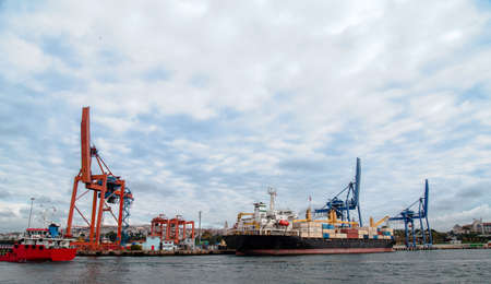 Container ship operation view from sea portの写真素材