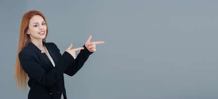 Beautiful smiling Turkish young woman, gestures thumbs up, Includes copy space.の写真素材