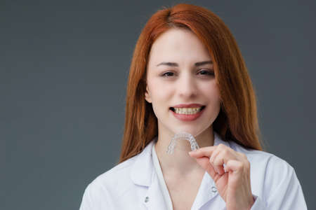 Beautiful smiling Turkish young woman, mobile phone concept. She is checking her mobile phone.