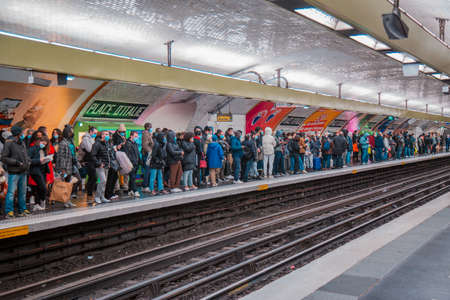 Paris, France; January 8 2022: Massive crowded people in Place d'Italie metro station.