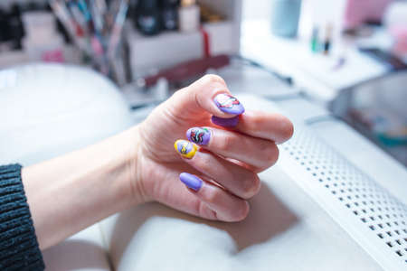Closeup detail view of nail art, beautiful designed nail art.の写真素材