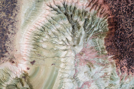 Aerial view of dried alluvial lake and mountainの写真素材