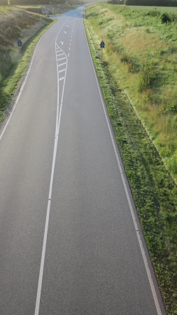 highway and crossing with a green traffic lightの写真素材