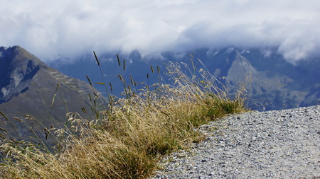 hiking path high in the mountains of Europe in the summerの写真素材