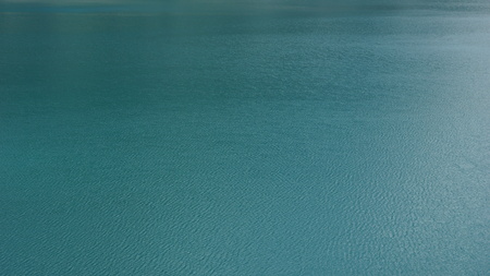 background of pure blue calm watersの写真素材