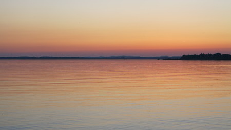 Beautiful sunset at the Chiemsee in Germanyの写真素材