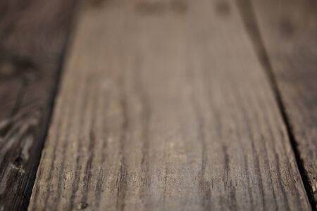 Abstract dark wooden background, natural optical blurの写真素材