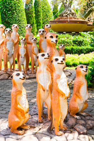 CHONBURI, THAILAND - March 18, 2016: Beautiful garden decoration in Nong Nooch Tropical Botanical Garden. Many meerkats. Nong Nooch Tropical Botanical Garden is a 500-acre botanical garden in Chonburi, Thailand.のeditorial素材