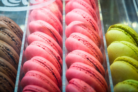 French macarons in shop for sale. Seletive focus.