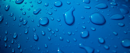 Raindrops on the blue backgroundの写真素材