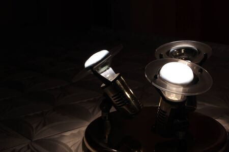 three light bulbs on the floorの写真素材