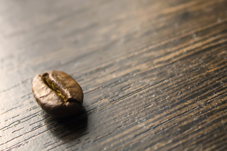 coffee bean on the table, wooden textureの写真素材