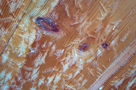 crystals of snowflakes on wooden boards closeupの写真素材